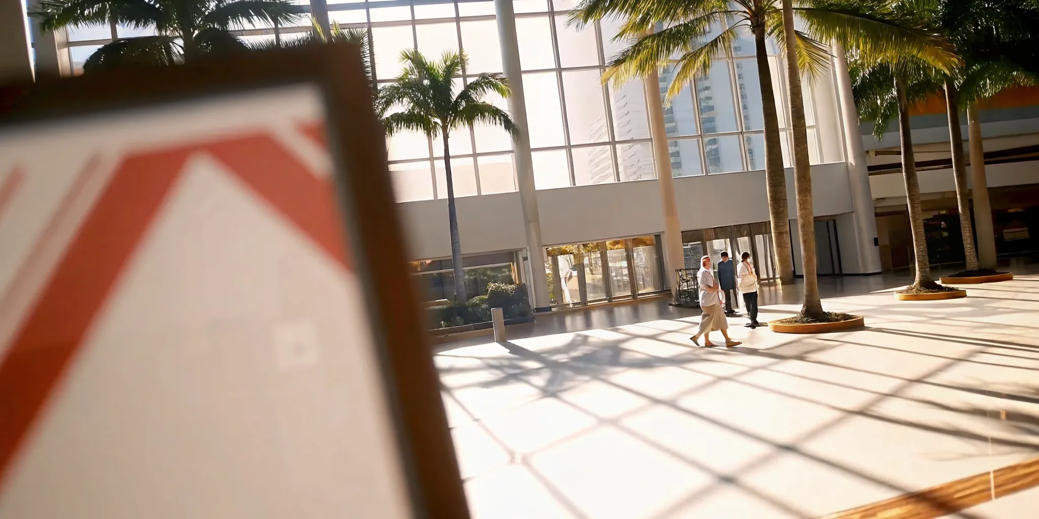 Commercial building exterior with code enforcement signage, Florida setting